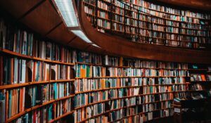 photo of brown wooden bookshelf